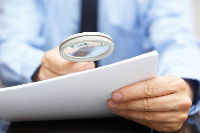 a person examining documents